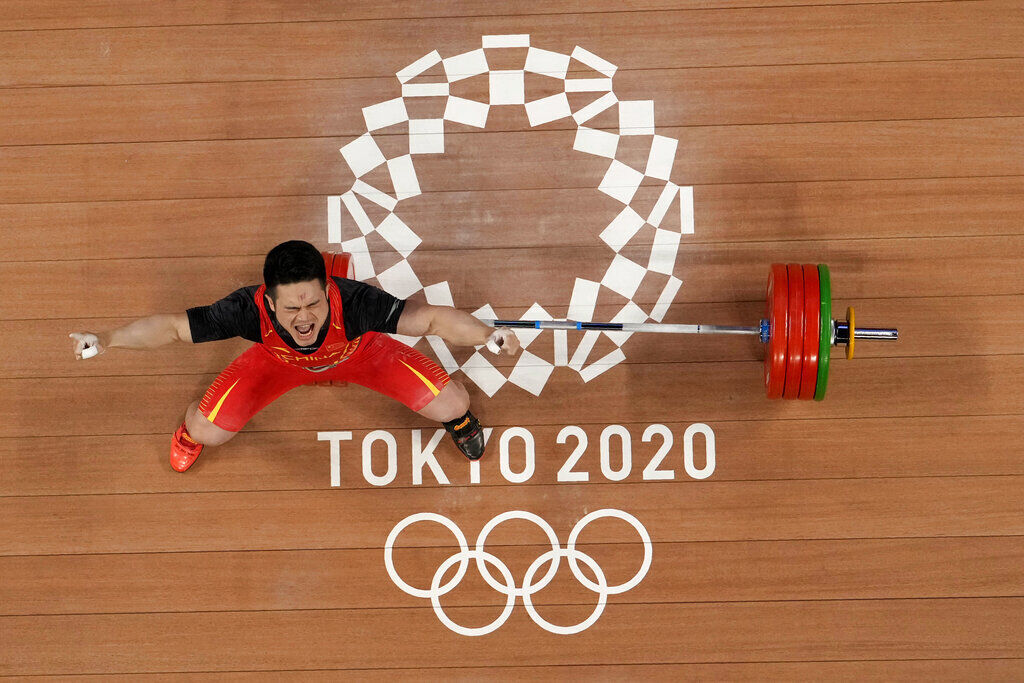 APTOPIX Tokyo Olympics Weightlifting Men